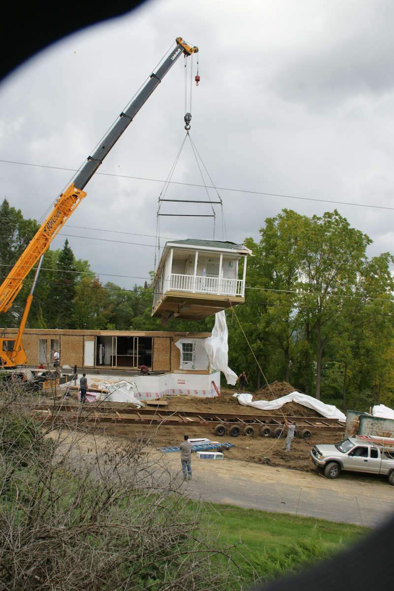 Module One with Carrier and workers.